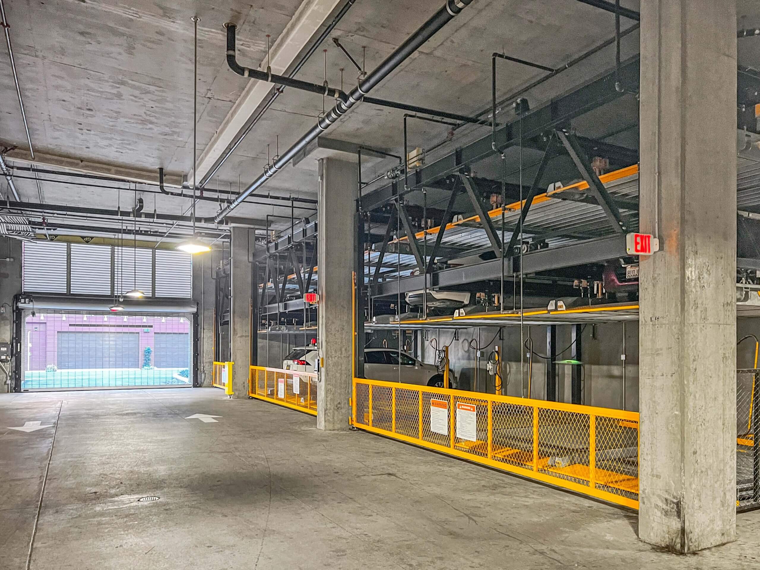 three level mechanical parking system within multifamily residential